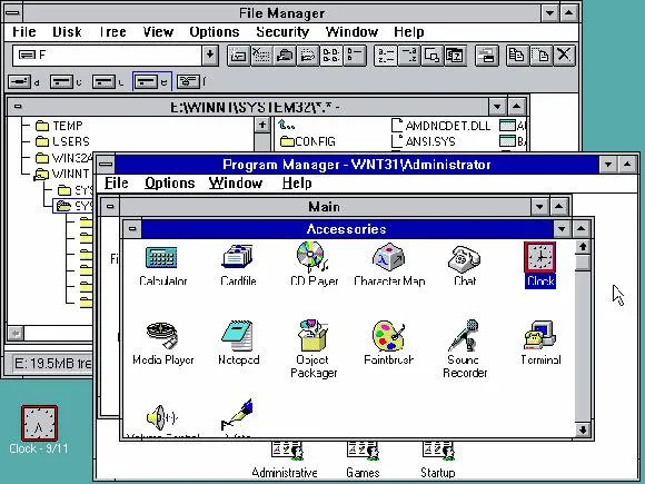 Windows NT 3.1 Program Manager ve Accessories grubu, arkada File Manager