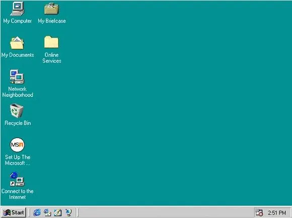 Windows 98 masaüstü, yeşil arka plan ve görev çubuğunda hızlı başlat simgeleri